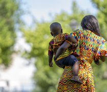 little-boy-with-his-mother-posing-in-the-park.jpg
